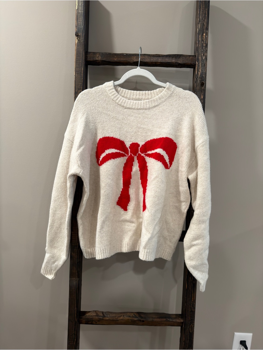 A New Day Cream Sweater With Red Bow